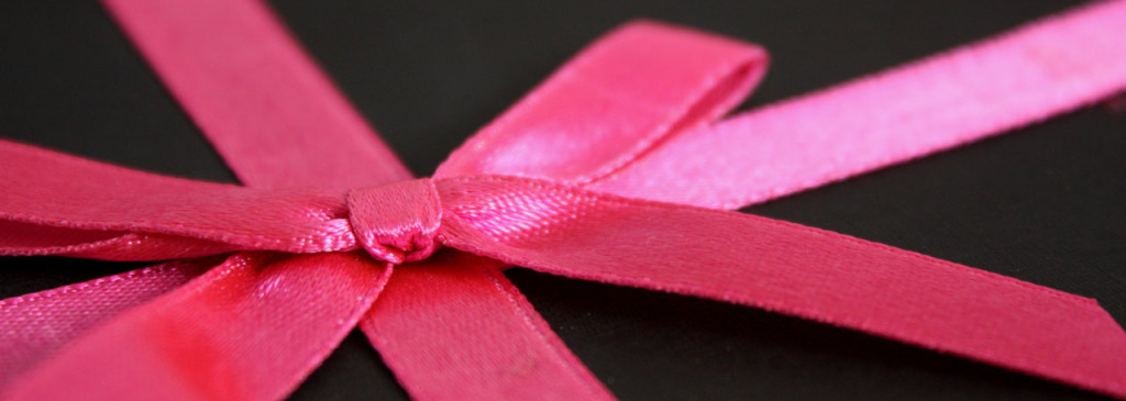 gift wrapped with pink ribbon
